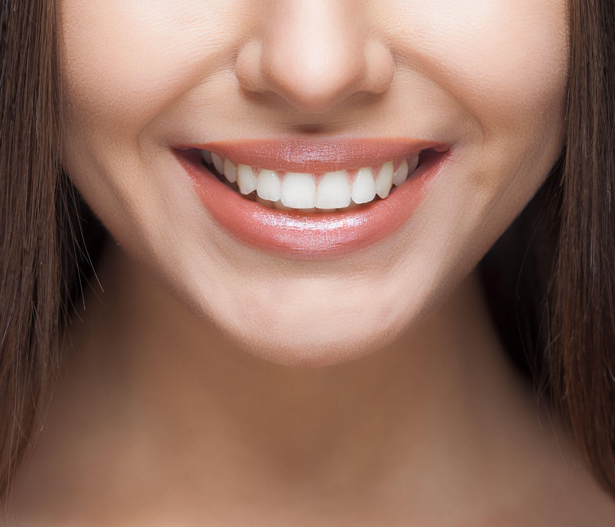 Teeth whitening from your dentist near Normal, IL does more than brighten your smile